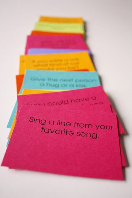 colorful notes with words written on them are lined up in a row and placed next to each other