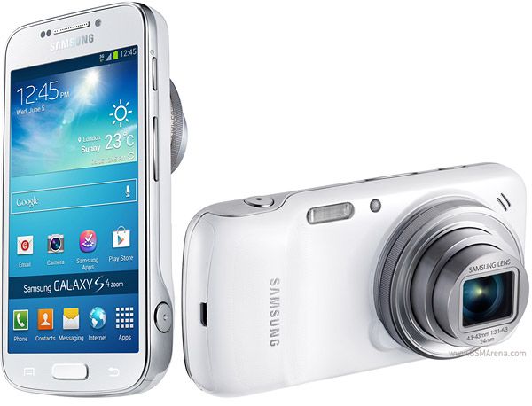 the samsung galaxy camera is next to an iphone