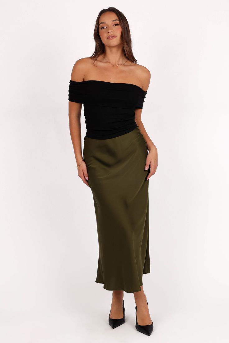 DETAILS     Introducing our gorgeous midi skirt to your wardrobe, perfect for adding a touch of glamour to any look. Featuring a  high waisted style and side invisible zip with a promise of comfort. The satin sheen finish gives it an extra touch of fun.    midi length   high waisted style  side invisible zip   satin sheen finish   pull on design  unlined   material - 97% polyester / 3% spandex     SIZING     model is 5' 7" and wears a Size S    model stats: bust - 33", waist - 26", hips - 38" Olive Green Satin Skirt Outfit, Satin Midi Skirt Outfits Summer, Satin Midi Skirt Outfit, Midi Skirt Outfits Summer, Satin Dresses Long, Skirt Outfit Summer, Midi Skirts Summer, Satin Dresses Long Sleeve, White Dress Shoes