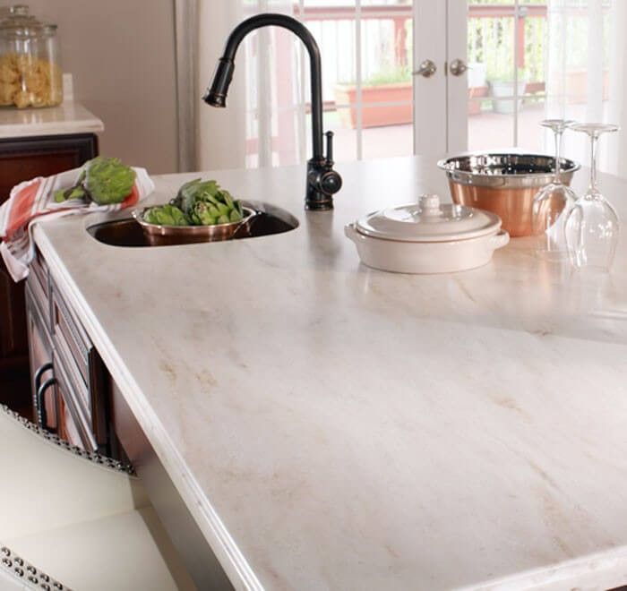 a kitchen counter with two bowls on it