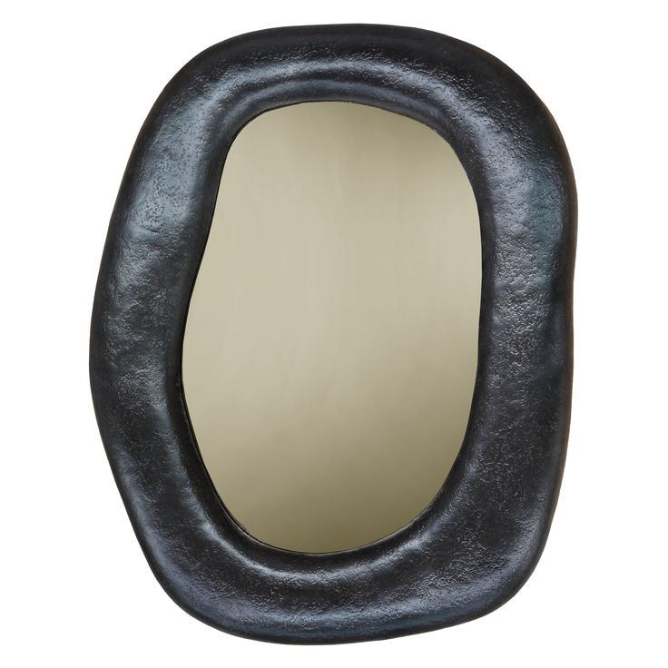 an oval shaped mirror is shown against a white background, with the reflection in it's black frame