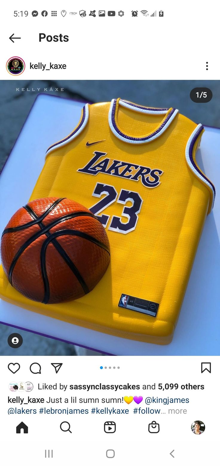 a cake made to look like a jersey with a basketball on it