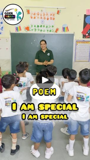 a teacher teaching children in front of a blackboard with the words poem i am special