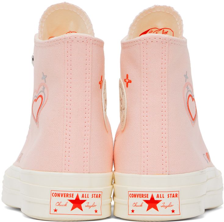 High-top canvas sneakers in pink. · Crystal-cut detailing and graphics bonded throughout · Rubber cap toe · Lace-up closure · Logo patch and eyelets at inner side · Rubberized logo patch at heel · OrthoLite® cushioned footbed · Treaded rubber sole Supplier color: Donut glaze/Egret Pink Chuck 70, Cute Converse Shoes, Pink Chucks, Cute Converse, Converse Pink, Preppy Shoes, Pretty Shoes Sneakers, All Stars Converse, Donut Glaze