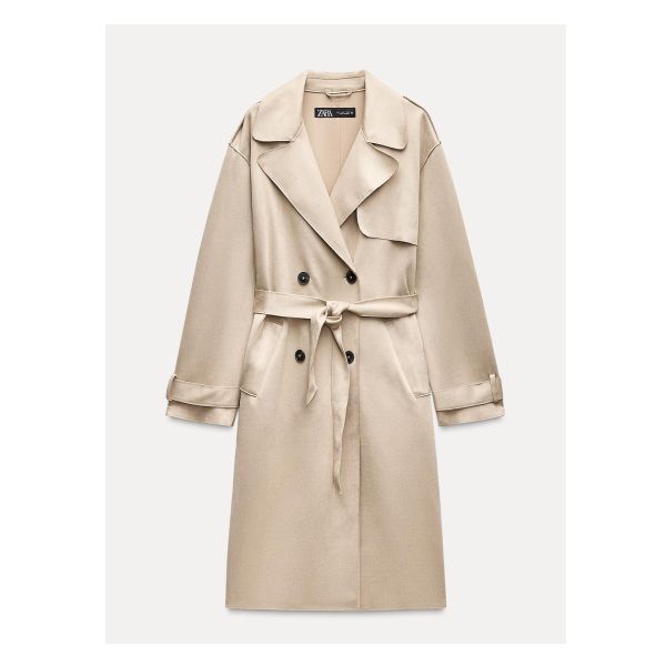 Double-breasted lapel collar trench coat. Long sleeves with epaulettes and belted cuffs. Front pockets. Self belt. Front double breasted button closure. Chic Beige Outerwear With Belted Cuffs, Long Gabardine Pea Coat For Spring, Spring Gabardine Long Pea Coat, Trendy Belted Outerwear For Work, Spring Long Gabardine Pea Coat, Chic Collared Belted Outerwear, Chic Belted Collared Outerwear, Chic Double-breasted Outerwear With Belted Cuffs, Trendy Double-breasted Outerwear With Belted Cuffs