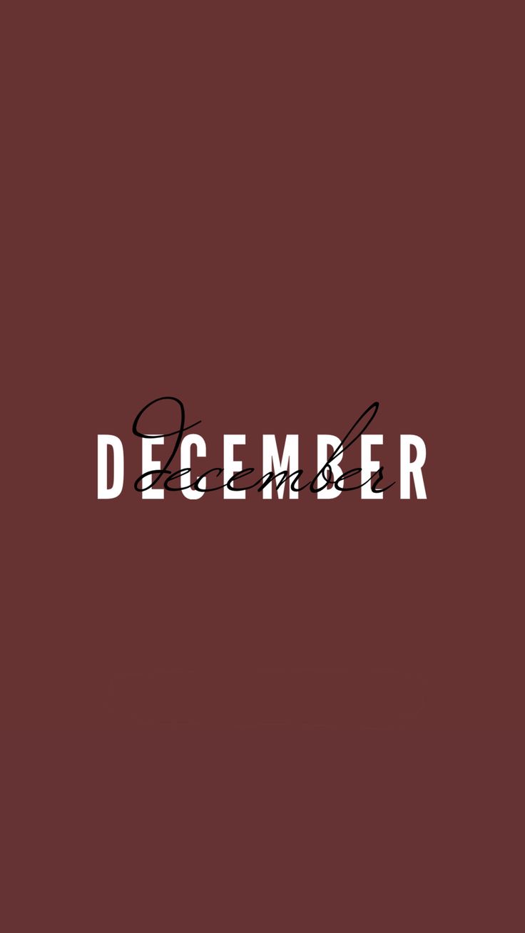 the word december written in black ink on a red background