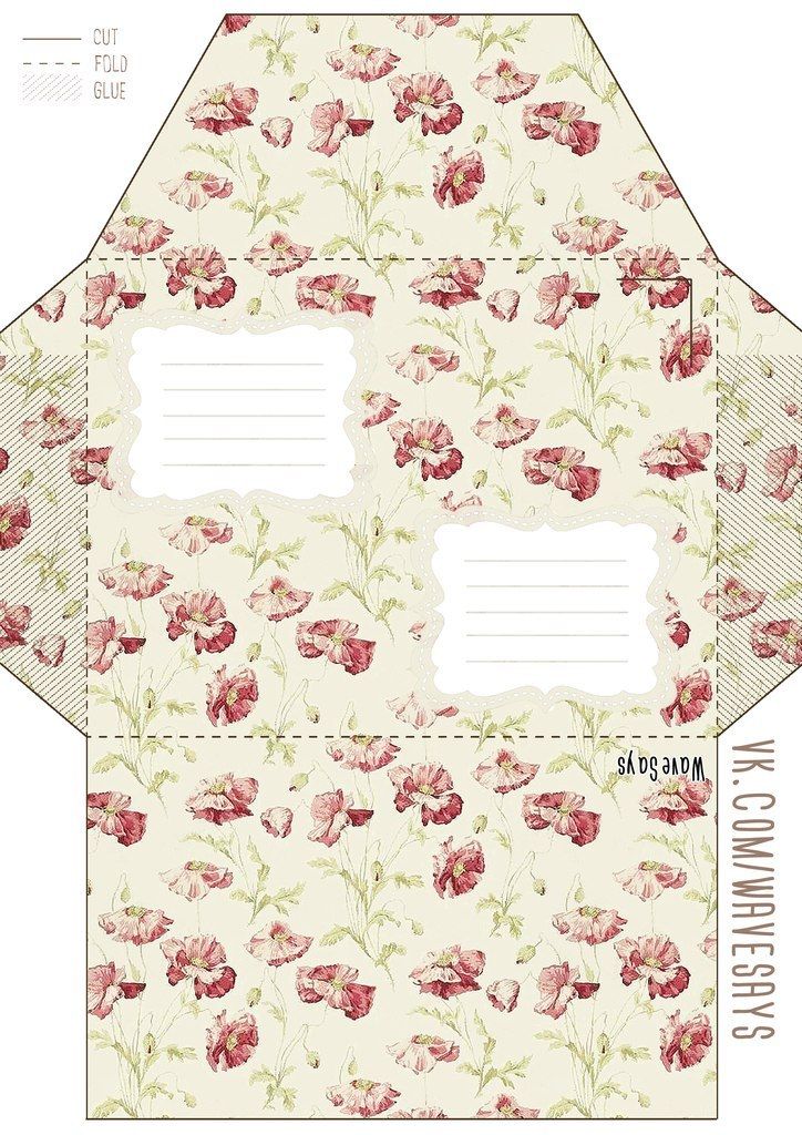 an open envelope with flowers on the front and side, cut out to look like it is