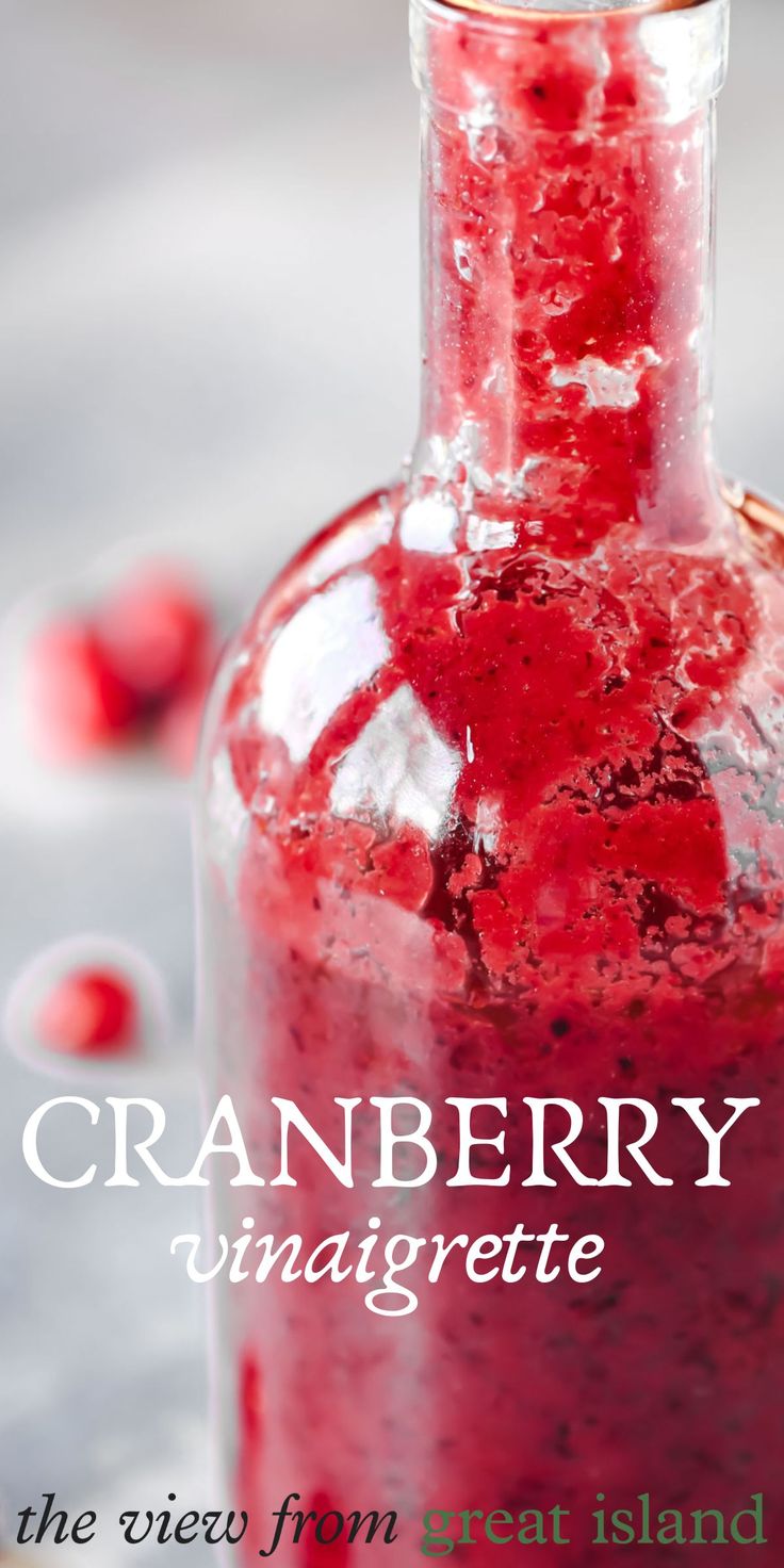 cranberry vinaigrette in a glass bottle with the words cranberry vinaigrette on it