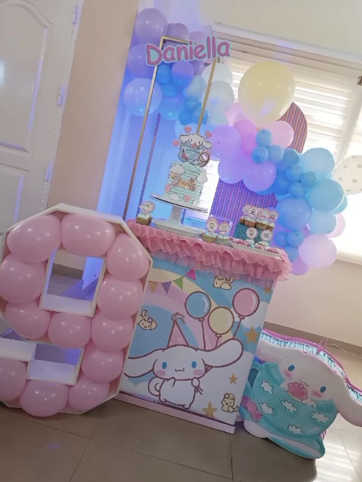 balloons and decorations are on display at a birthday party