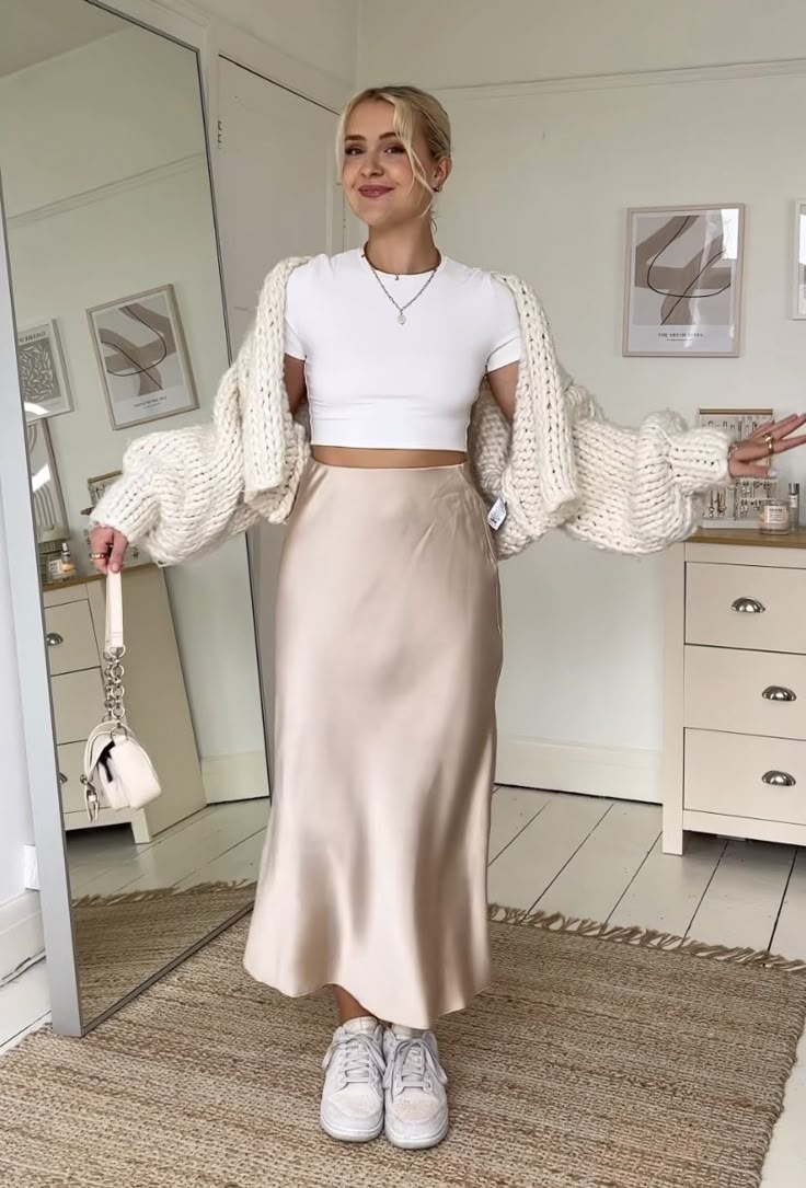 Satin Skirt Inspo Outfit, Casual Fashion Show Outfit, Gold Long Skirt Outfit, White Satin Midi Skirt Outfit, Silk Dress With Cropped Sweater, Satin Skirt With Corset Top, Taupe Silk Skirt Outfit, Outfit Ideas Neutral Color, Satin Skirt Beige