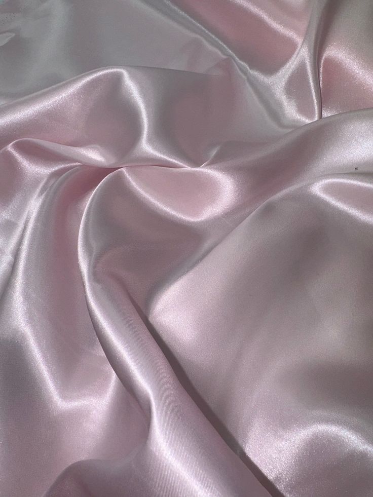 Baby pink satin fabric Add a delicate touch to your apparel, curtains, bedding, costumes, and crafts with this sun yellow satin fabric. Its light fabric weight and solid/plain pattern make it a versatile choice for any project. Measuring 58 inches wide, this fabric is perfect for draperies, cushions, and everyday clothing. The exact colour of the fabric is baby pink, making it an ideal choice for weddings, decorations and bridal wear. Use this fabric for draping and create a soft, romantic atmosphere. This satin fabric is an excellent choice for any DIY project. Delivery All items are dispatched within 1-2 working days. All items are sent with royal mail 1st class post Item will be sent within 1 day of cleared payment I accept returns within 30 days of purchase Return postage will be occur Pale Pink Fabric, Baby Pink Aesthetic Vintage, Clothing Fabric Patterns, Pink Curtain, Satin Curtains, Baby Pink Satin, Pink Satin Fabric, Light Pink Fabric, Baby Pink Color