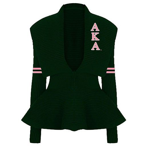 a green sweater with pink letters on the chest and an aka embroidered on the back