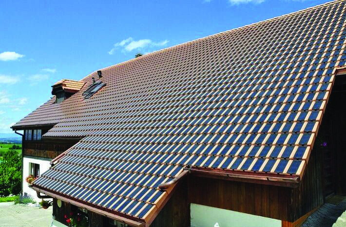 the roof of a house with solar panels on it