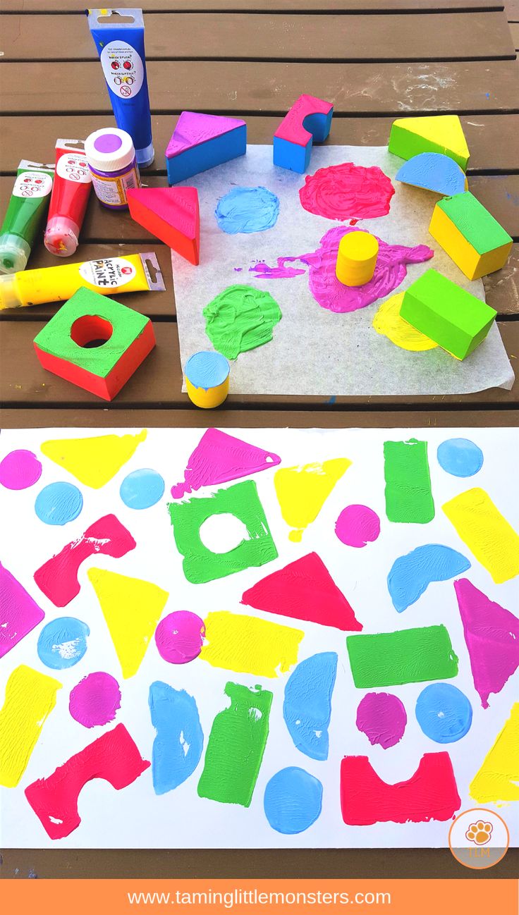 this is an easy art project for kids to do with construction paper and colored shapes