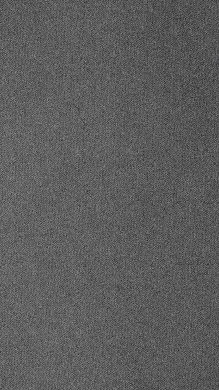 an image of a dark gray background that looks like it is made out of fabric