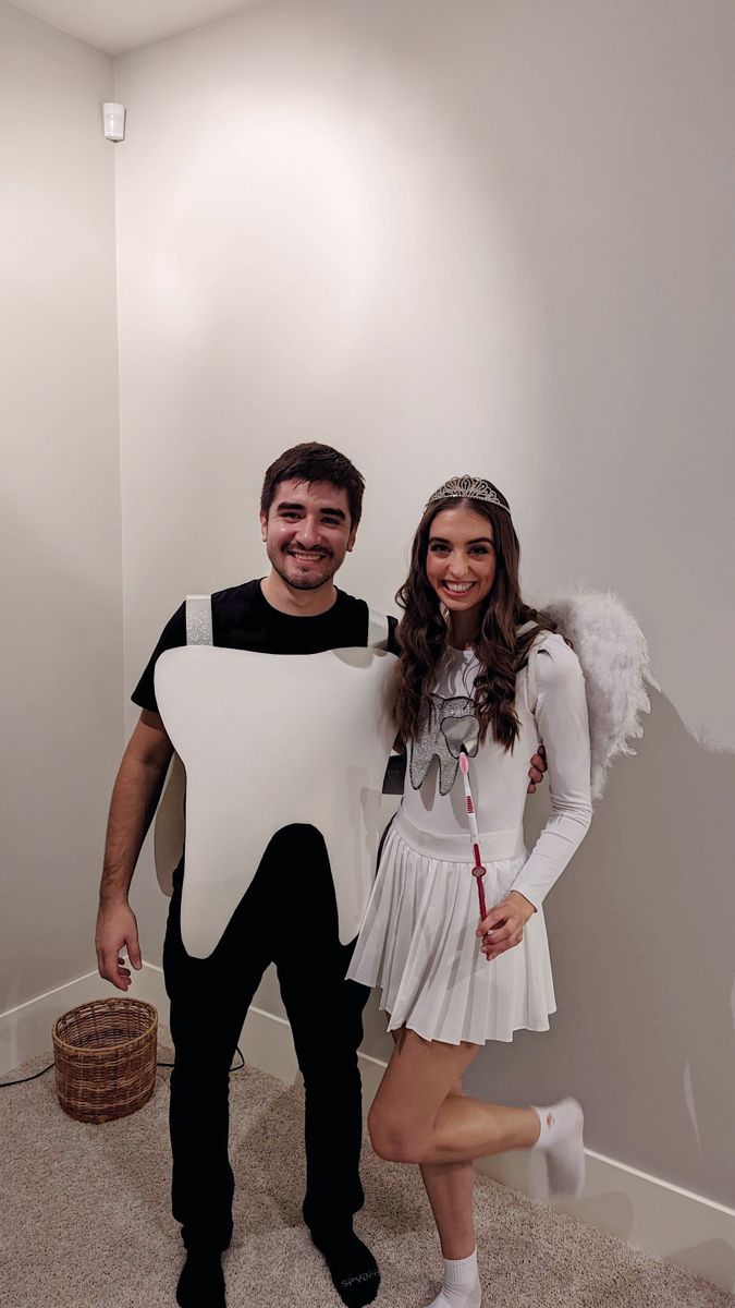 a man and woman dressed up in costumes