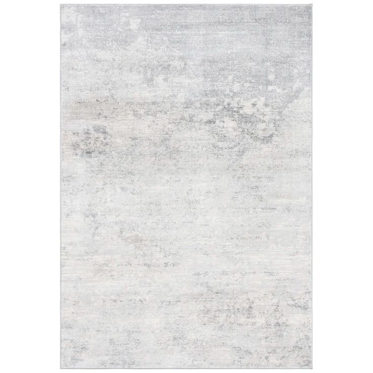 an area rug with white and gray colors