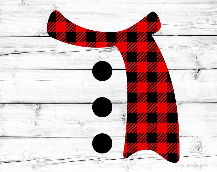 a red and black plaid tie on a wooden background