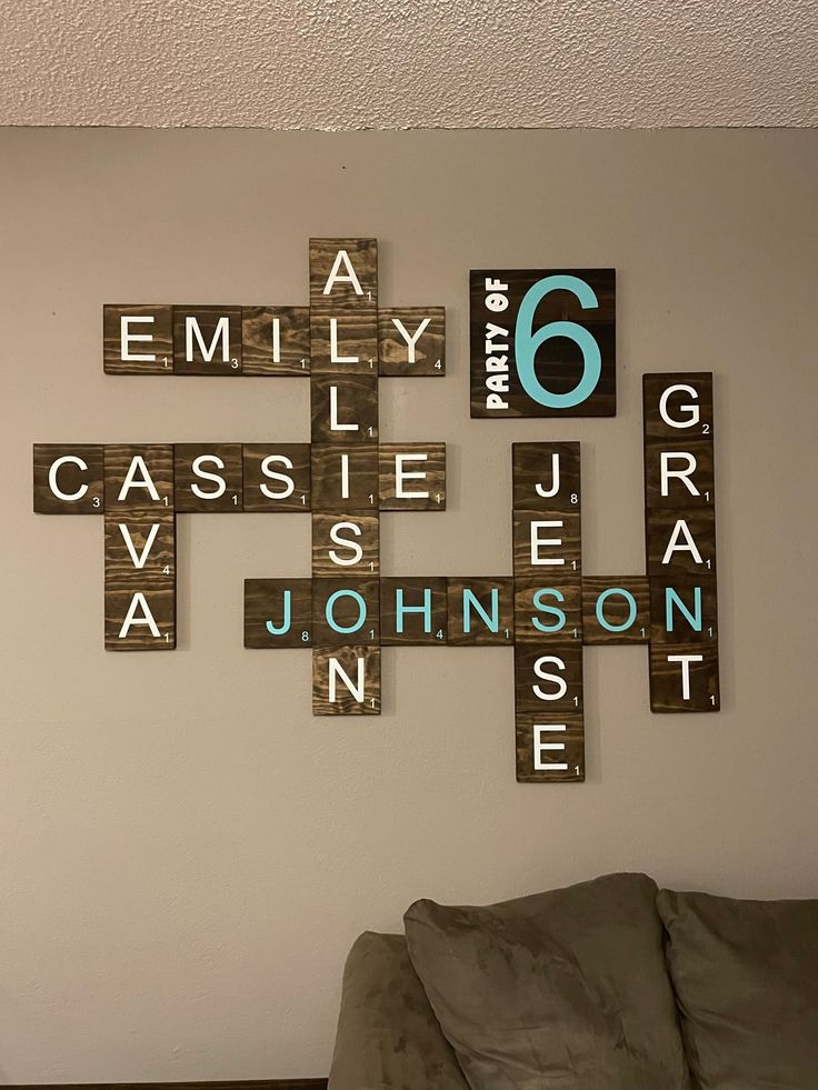 a living room filled with furniture and scrabble tiles