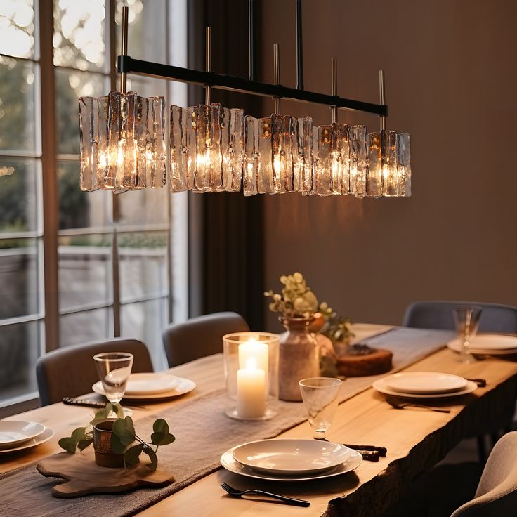 a dining room table is set with plates and place settings