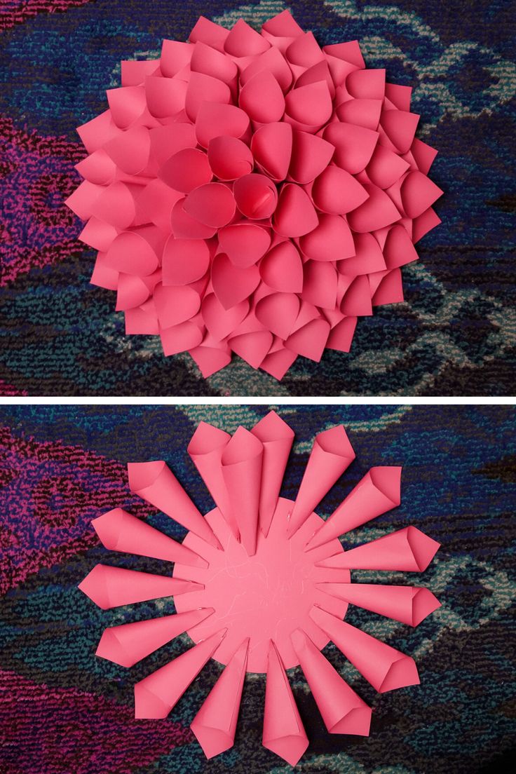 two pictures of pink paper flowers on blue and purple carpeted area, one is folded up in the shape of a flower