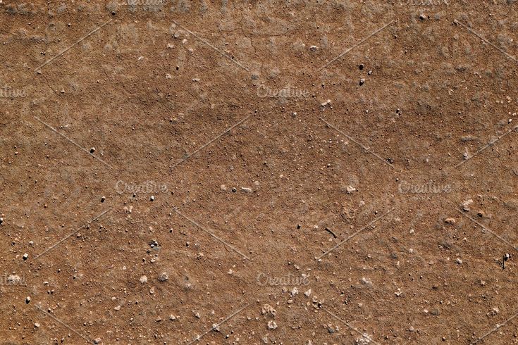 the texture of an old wall with little holes in it, as seen from above