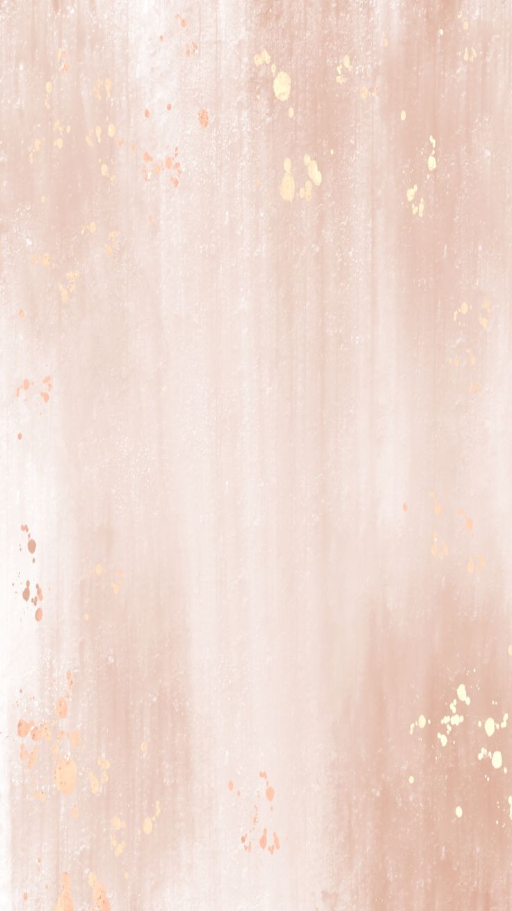 an abstract pink background with gold paint splattered on the wall and in the corner