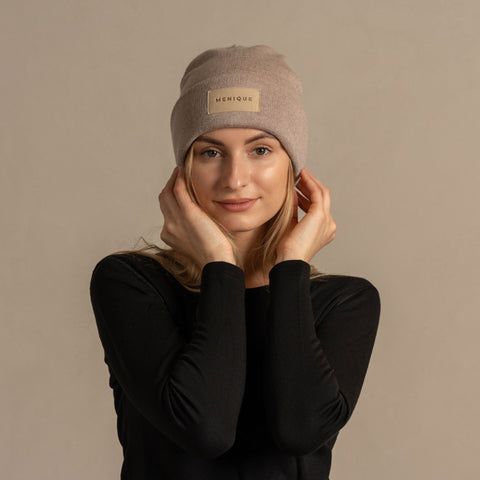 In the frosty symphony of winter, our Merino wool beanie weaved a tale of warmth, embracing heads in a cozy journey through the cold. Crafted with natural 100% Merino wool yarns, the women’s beanie brings versatile style, ensuring your ears stay toasty and your head stays warm, all while keeping you looking great. Soft to the touch without the risk of feeling we or clammy, this hat for women also features a folded stylish design that allows you to tailor it to your needs. Embrace the cold confidently with our ribbed Merino wool beanie, it's a perfect idea for a gift, especially for women who appreciate sustainability, comfort, and warmthGENDER: FemaleTYPE: BeanieFABRIC: 100% Wool MerinoSEASON: Fall/Winter/SpringMADE IN: Lithuania Winter Beige Bonnet (one Size Fits Most), Warm Beige Bonnet One Size, Cozy Soft Knit Beige Bonnet, Cozy Beige Soft Knit Bonnet, Warm Beige Bonnet, Beige Beanie Bonnet For Fall, Beige Soft Knit Beanie Hat, Beige Soft Knit Beanie, Beige Knitted Bonnet Beanie