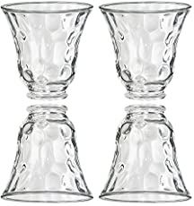 three clear glass vases sitting next to each other