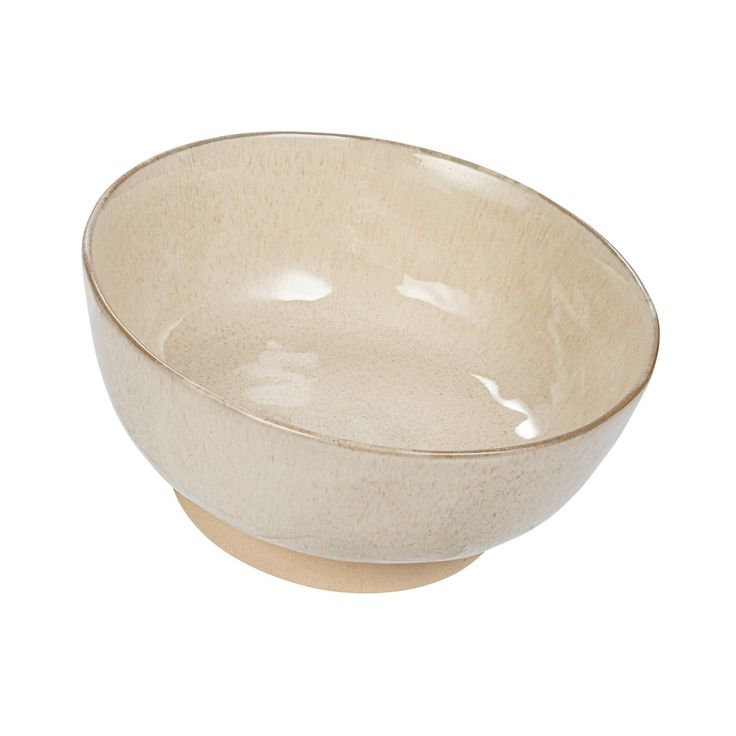 a white bowl sitting on top of a table