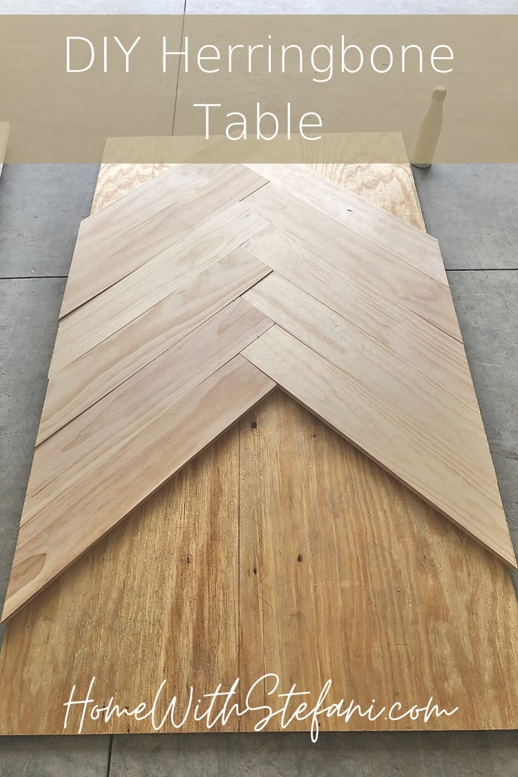 the diy herringbone table is made from plywood and has been cut into four sections