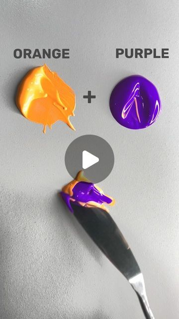 an orange and purple paint is being used to make art