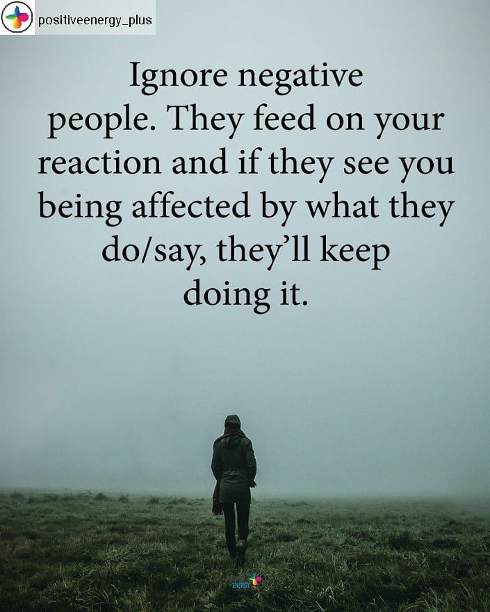 a person standing in a field with the words ignore negative people they feed on your reaction and if they see you being affectioned by what they'll keep doing it