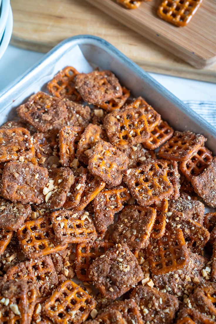 a tray filled with pretzels sitting on top of a table