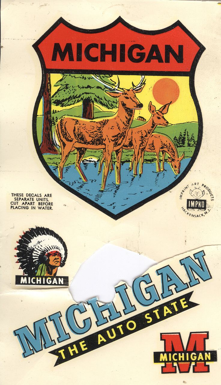 the michigan state sticker is on top of a white paper with an image of two deer