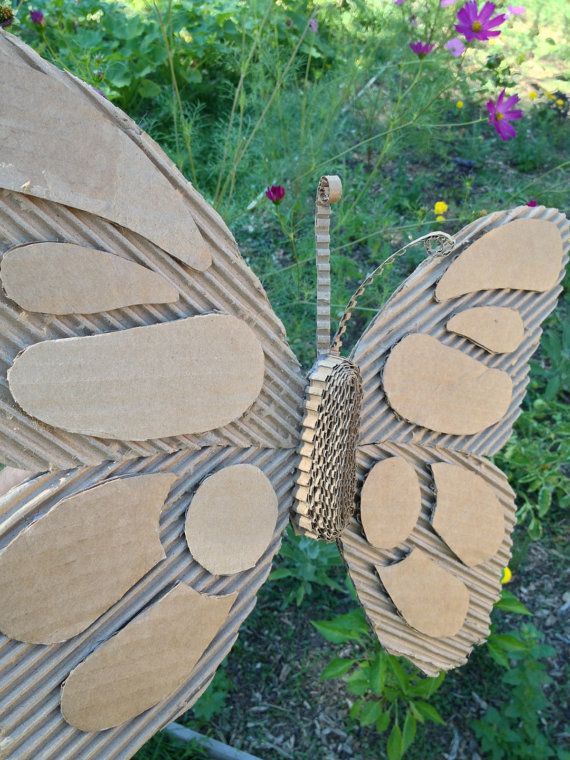 a close up of a butterfly made out of cardboard