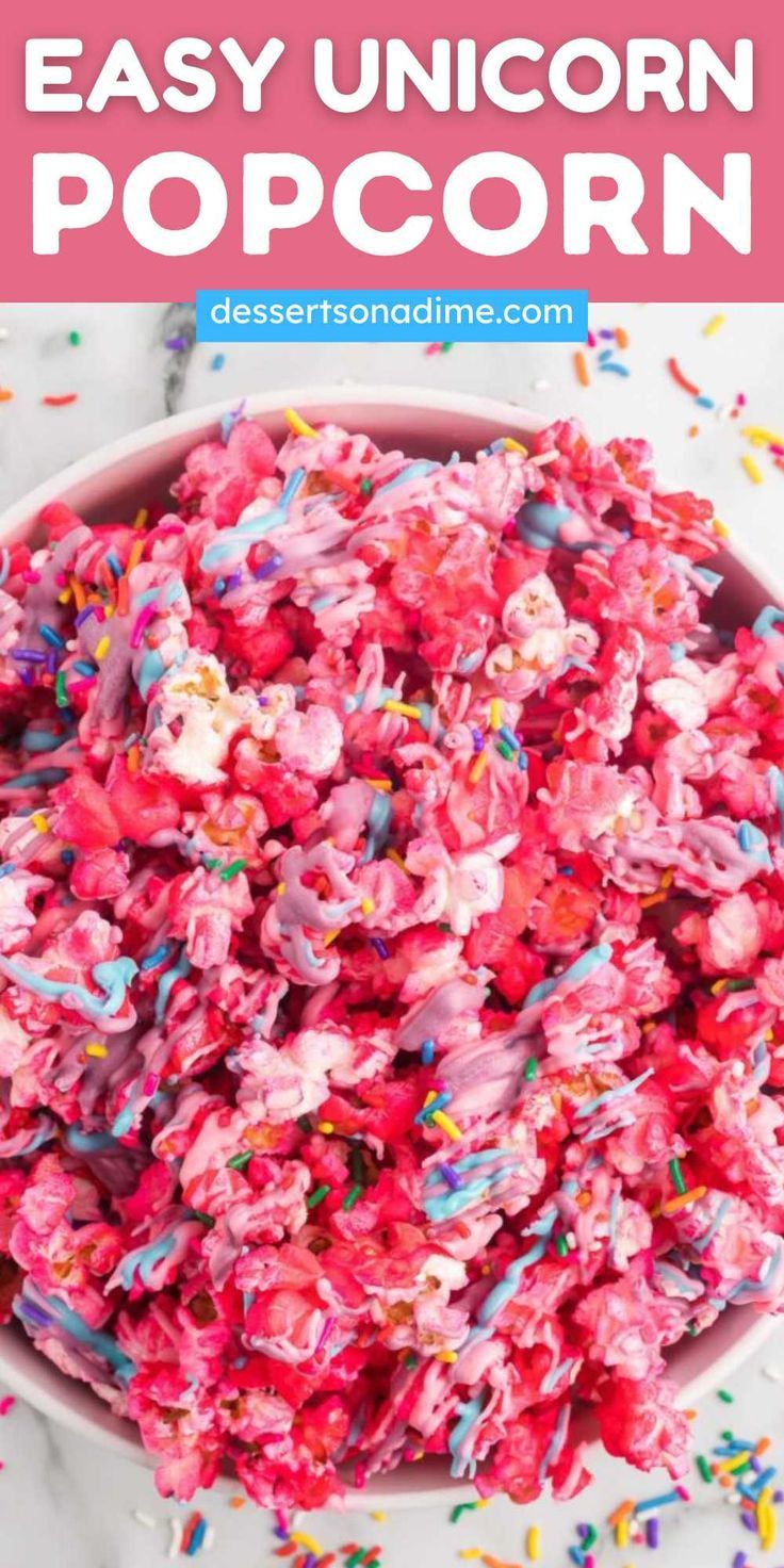 a pink bowl filled with sprinkles and the words, easy unicorn popcorn