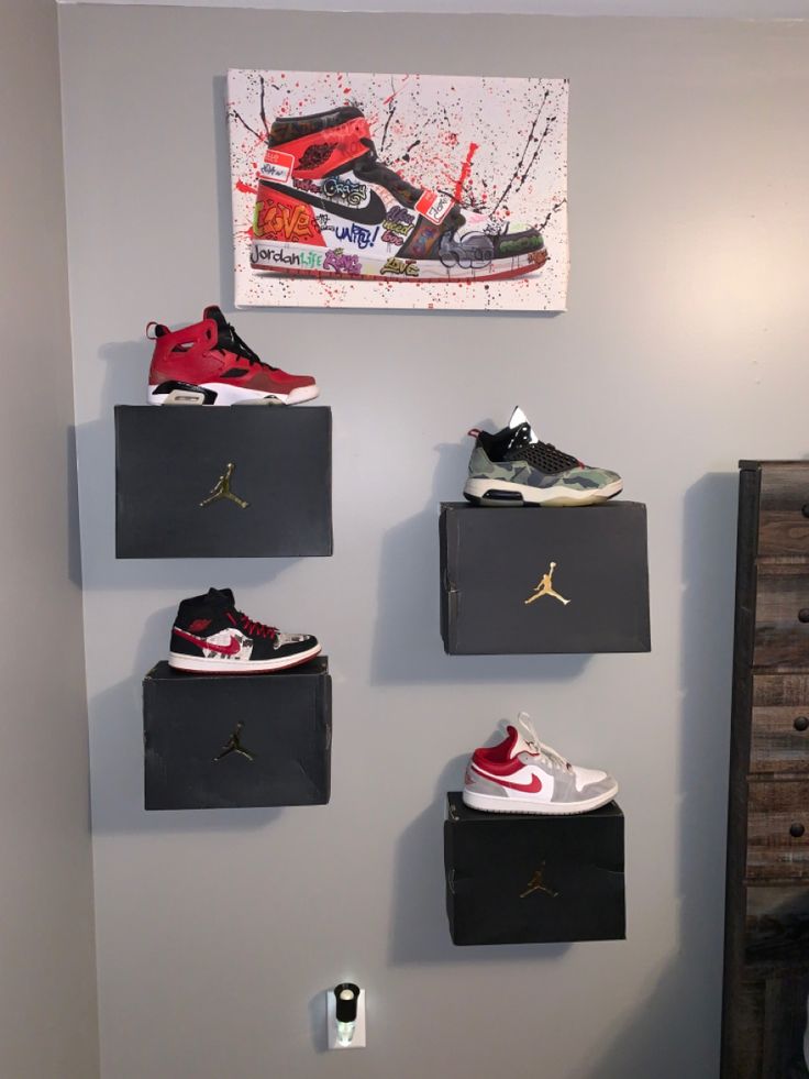 there are many pairs of shoes hanging on the wall