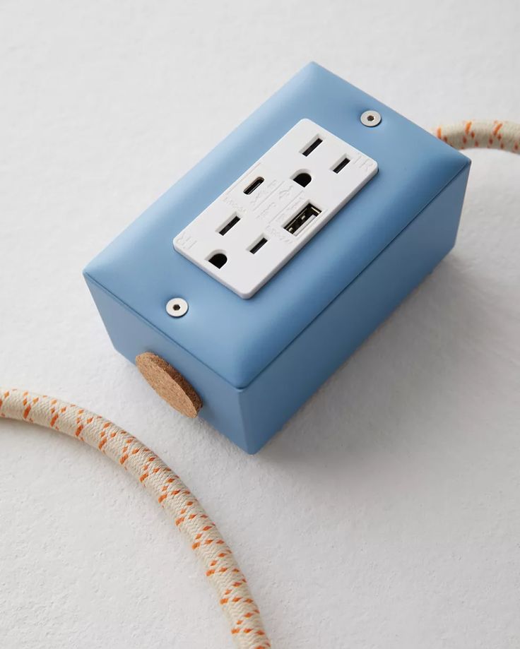 an electrical outlet plugged in to a cord