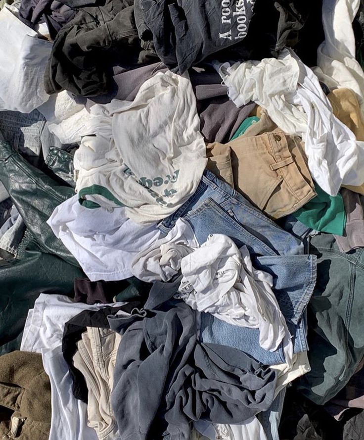 a pile of clothes sitting on top of each other