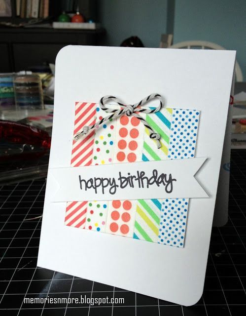 a happy birthday card is displayed on a table with other crafting supplies in the background