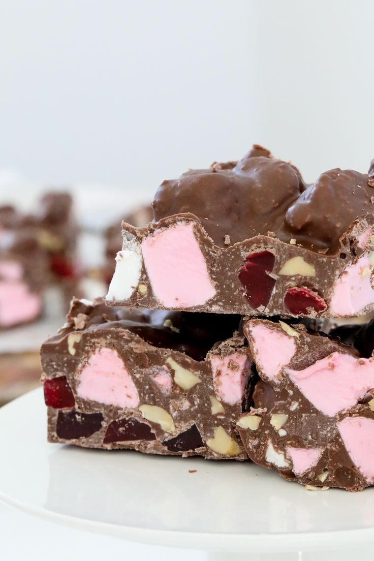 chocolate rocky road with raspberries and almonds on top, stacked on each other