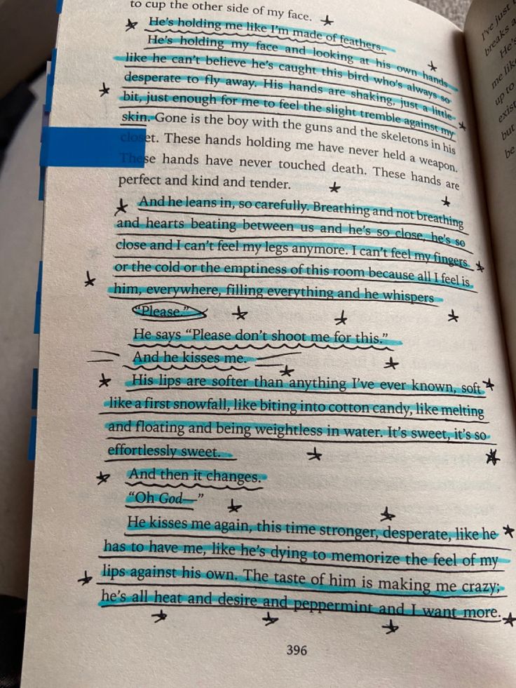 an open book with blue writing on the page and some lines in it that appear to have been altered