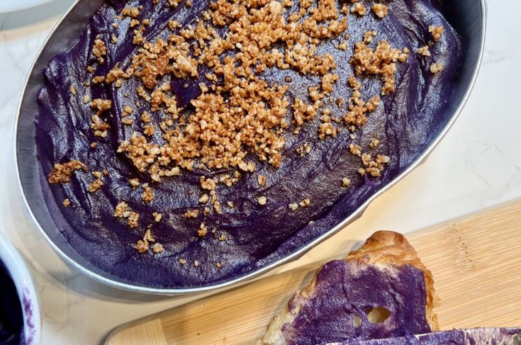 the food is prepared and ready to be cooked in the oven, including an eggplant