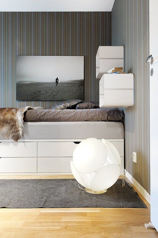 an image of a bedroom setting with the text 11 diy a platform storage bed