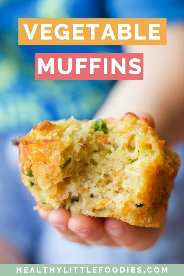 a person holding a muffin in their hand with the words veggie packed savory muffins