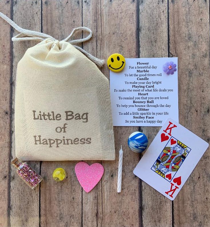 a little bag of happiness with cards, candy and other things to make it happen