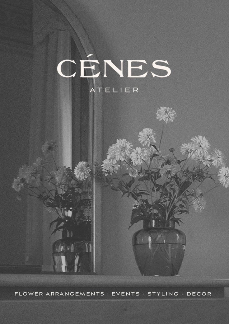 vases with flowers sit on a shelf in front of a mirror that reads, cenes atelier