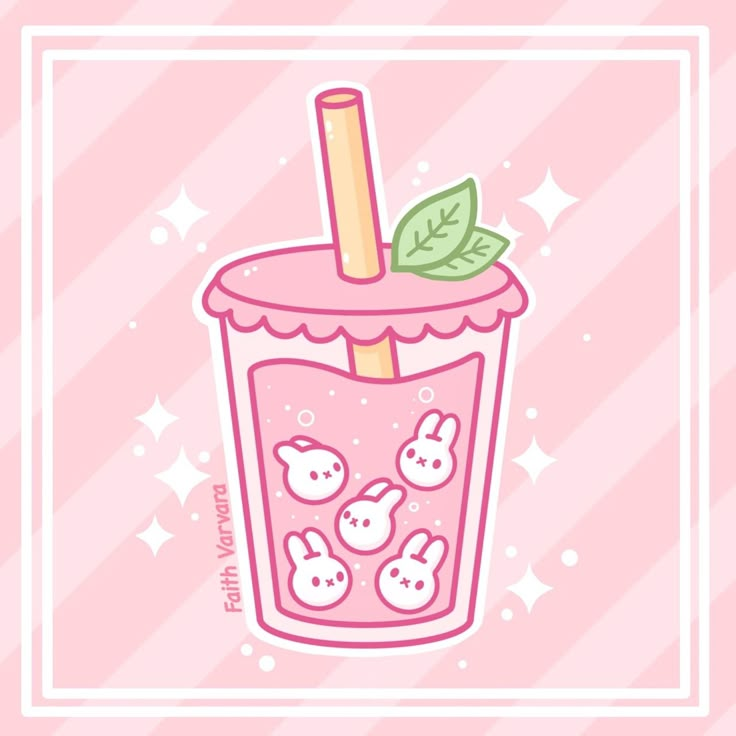 a pink drink with bunny faces in the bottom and green leaf sticking out of it