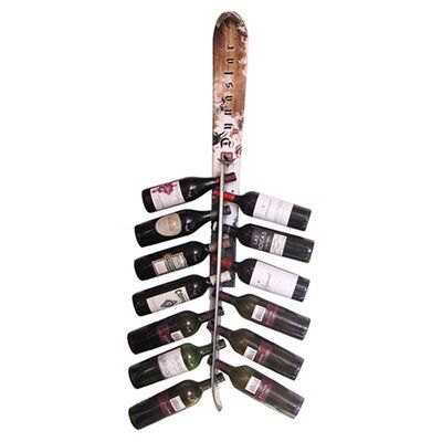 a wine rack with six bottles and two skis hanging from it's side